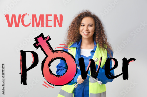 Female worker and text WOME...