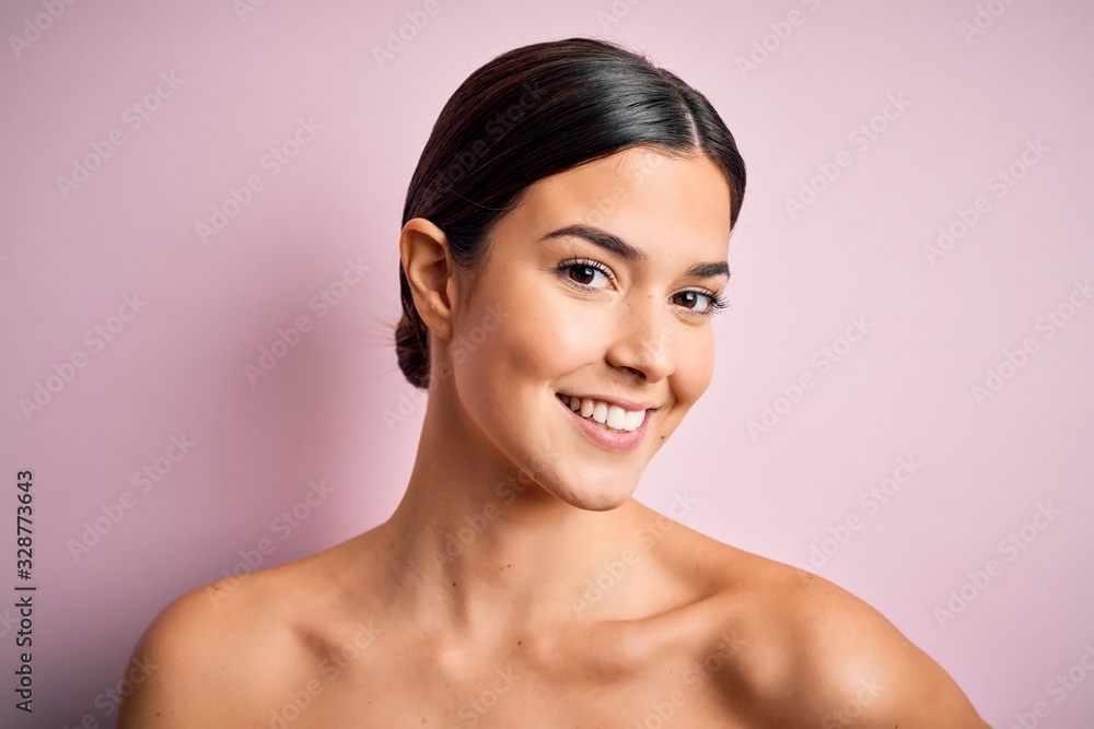 Close up of young beautiful woman with clear and pure skin. Perfect and clean skincare wearing natural makeup. Smiling happy looking fresh and healthy. Close up of young beautiful woman with clear and pure skin. Perfect and clean skincare wearing natural makeup. Smiling happy looking fresh and healthy.