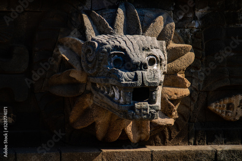 Mexican ancient historic sculptures in Quetzalcoatl temple at Teotihuacan, Mexico photo