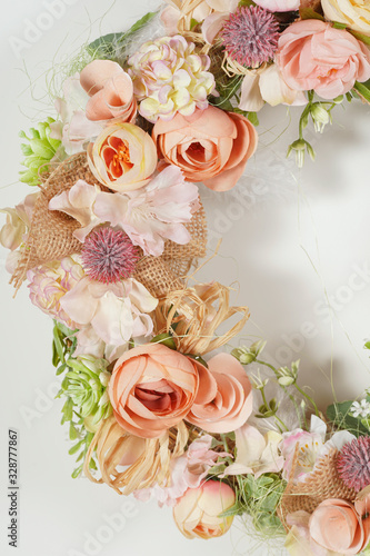spring floral wreath with door decor on white background