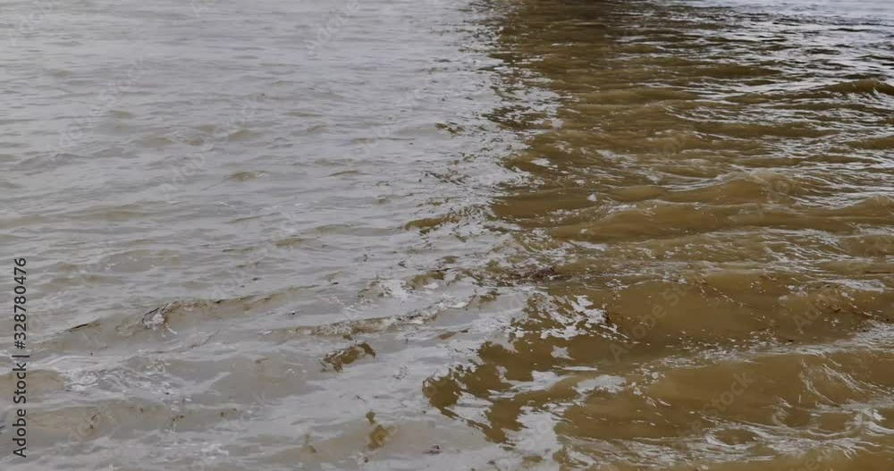 Strong, swift and rapid tide of river. rough stream wave. Strong, swift and rapid tide of river. rough stream wave.