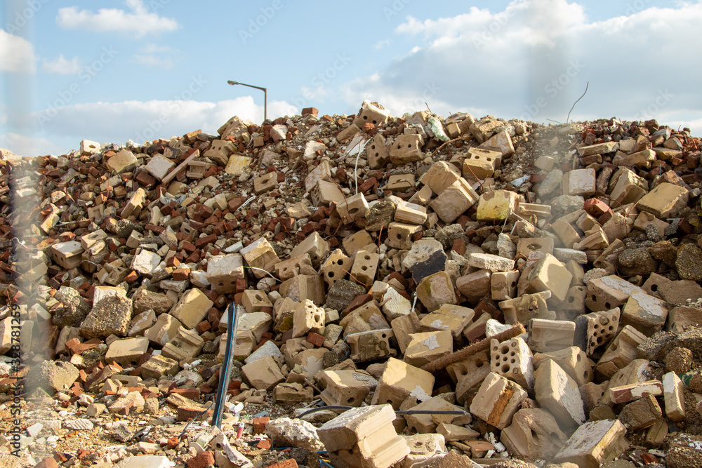 stones and other material on a mound after demoplition work on a house