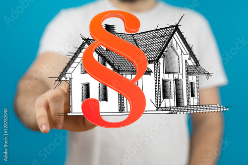 law house contract in hand