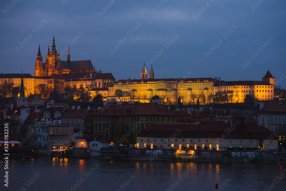 Evening walk and sightseeing while traveling in the fall to Prague, Czech Republic. Charles bridge and promenade. Eurotrip. Historic cities in Europe. Autumn in Prague, Europe Travel.