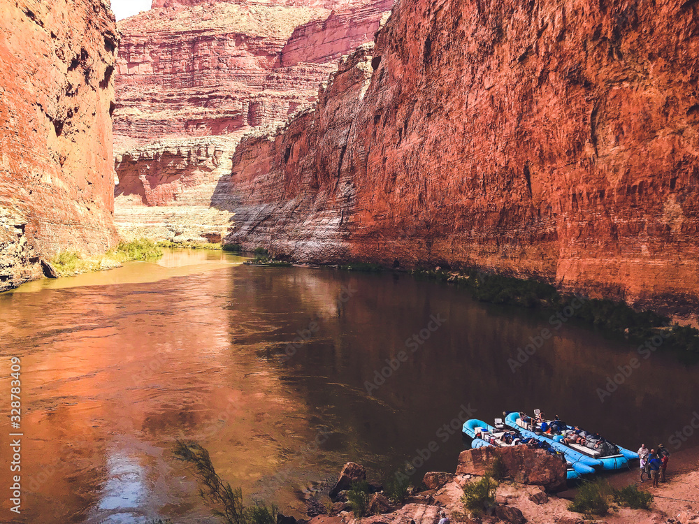 Redwall Cavern view with large rafts on the beach during a Colorado