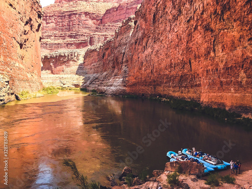 Redwall Cavern view with large rafts on the beach during a Colorado River trip through Marble Canyon, Grand Canyon National Park, UNESCO World Heritage Site, Arizona