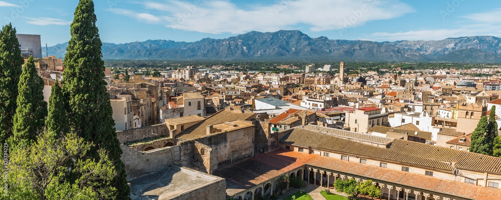 Panorama top view of city buildings with the Templer Monastery of Santa Clara, Tortosa, Catalonia, Spain 