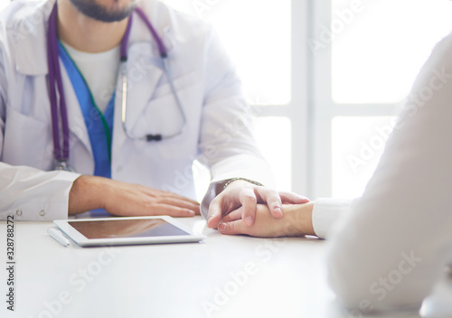 close up of patient and doctor prescribing medication