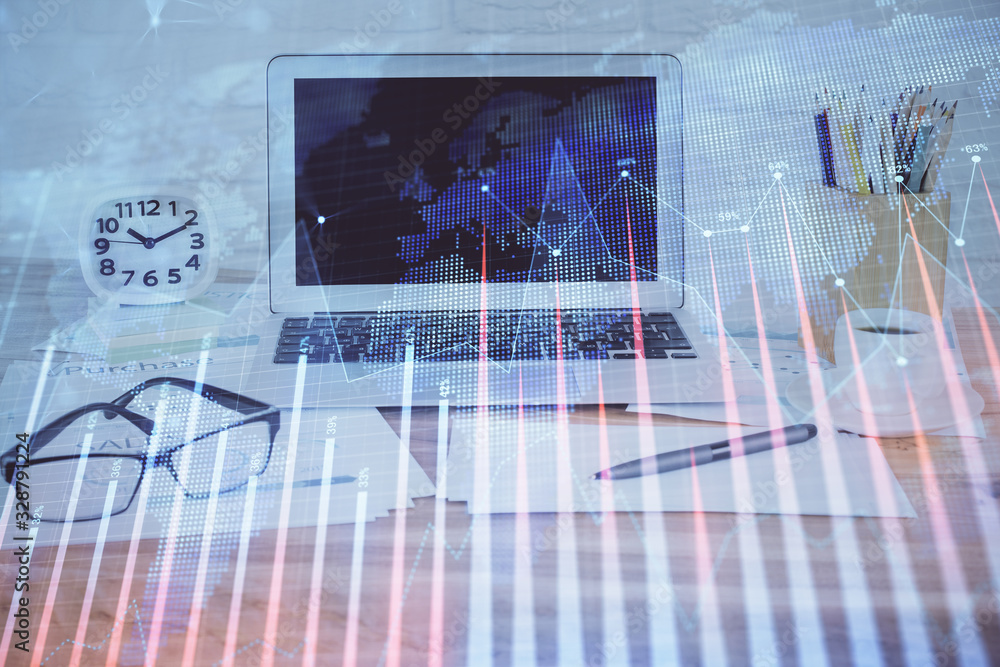 Forex market chart hologram and personal computer background. Double exposure. Concept of investment. Forex market chart hologram and personal computer background. Double exposure. Concept of investment.
