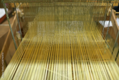 Kyoto,Japan-February 26, 2020: Weaving machine of Nishijin Ori or Nishijin silk fabrics or Nishijin brocade in Kyoto photo