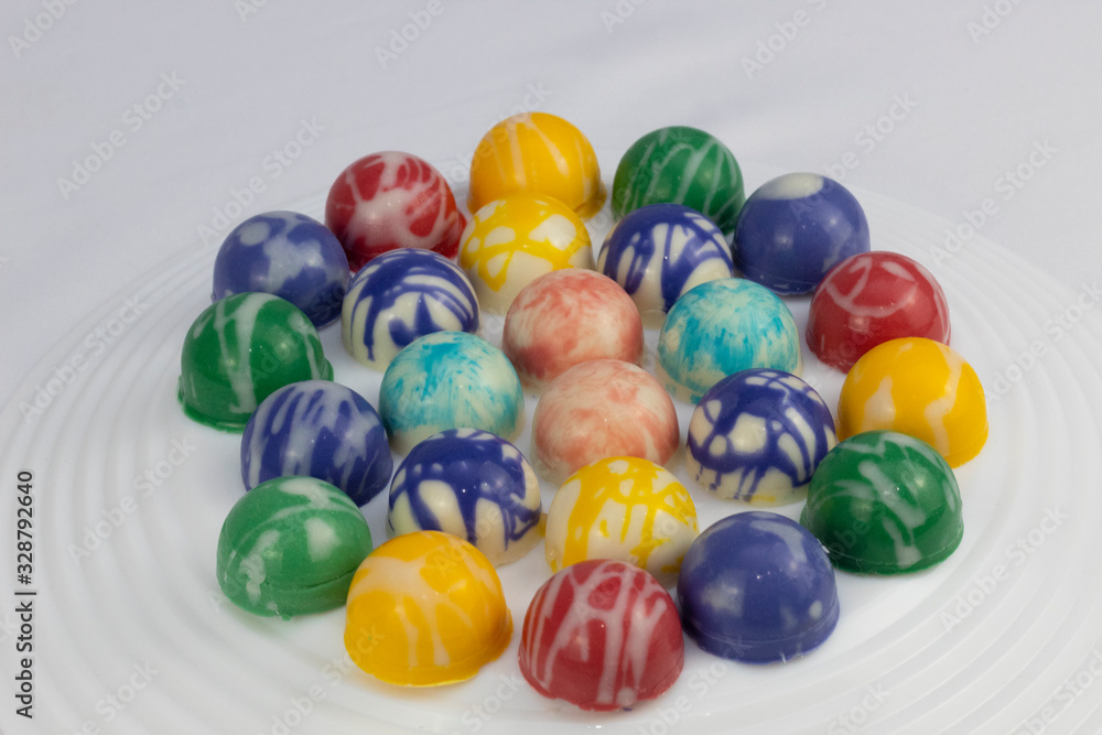 colorful chocolate candies filling passion fruit liqueur colorful chocolate candies filling passion fruit liqueur