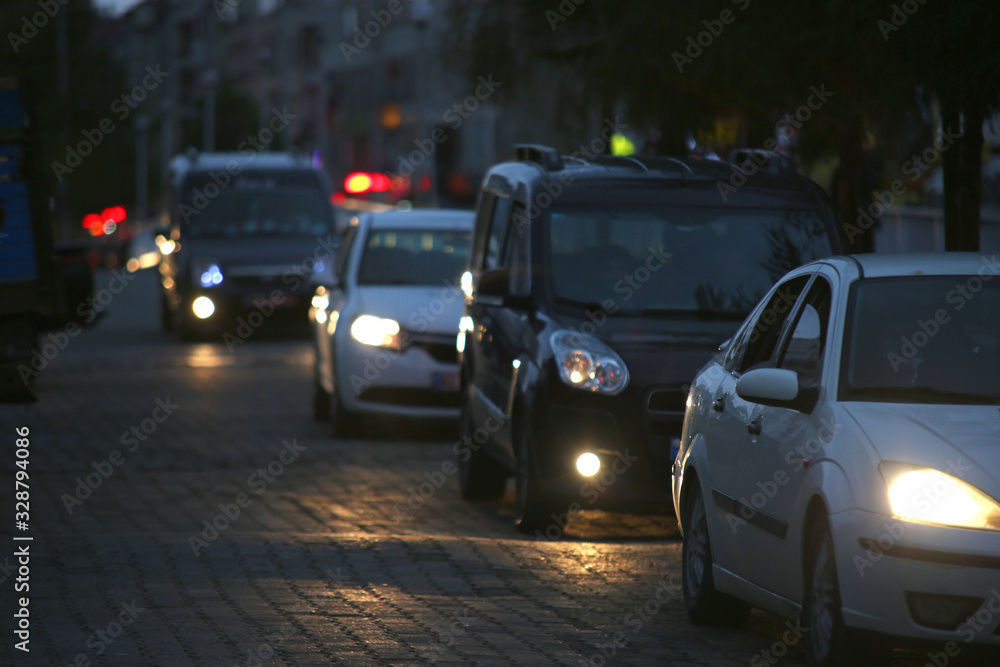 cars cruising in the evening traffic