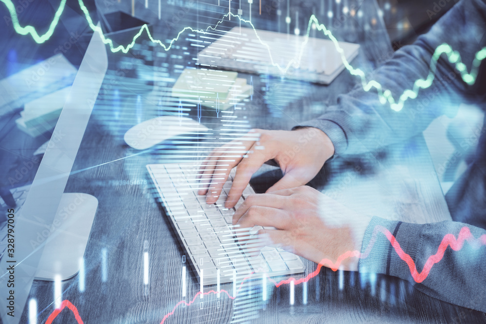 Stock graph with businessman typing on computer in office on background. Concept of analysis. Double exposure. Stock graph with businessman typing on computer in office on background. Concept of analysis. Double exposure.