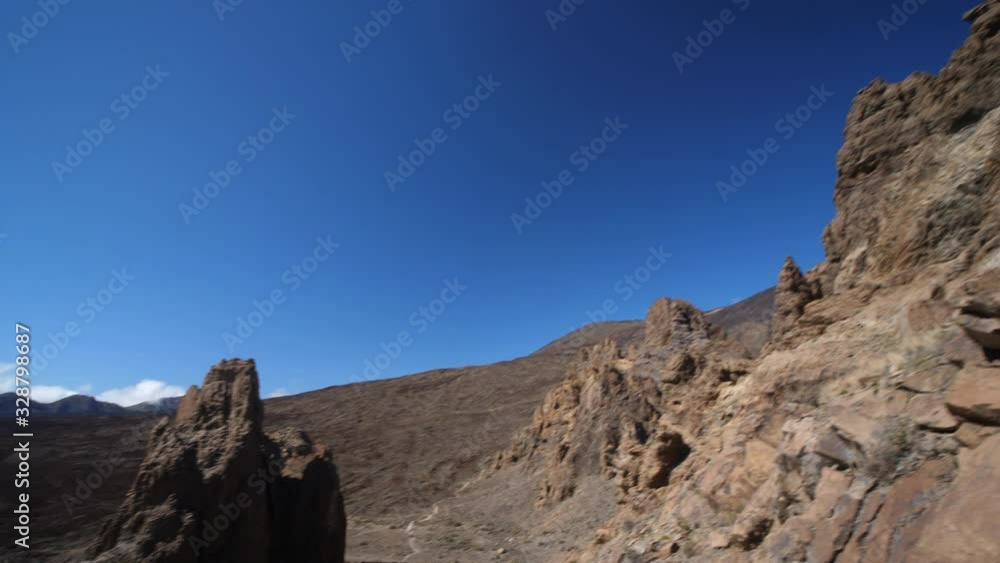 Teide national park Roques De Garcia scenery beautiful Panoramic view. Sunny day blue Sky. Santa Cruz De Tenerife, Canary Islands. Teide national park Roques De Garcia scenery beautiful Panoramic view. Sunny day blue Sky. Santa Cruz De Tenerife, Canary Islands.