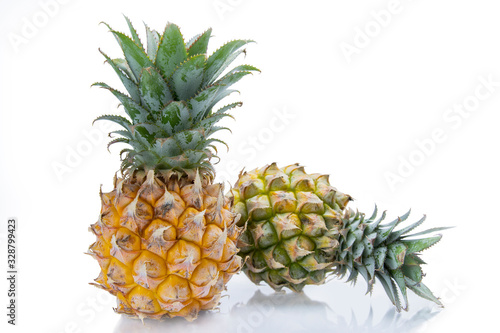 Two pineapples fruit isolate on white background.