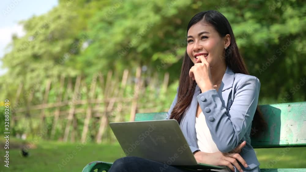 smart Asian businesswomen working with laptop and smartphone, concept of freelance working online smart Asian businesswomen working with laptop and smartphone, concept of freelance working online
