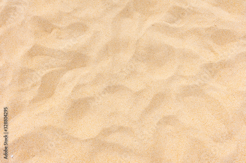 Close up of beautiful sand texture on the beach in summer time as background