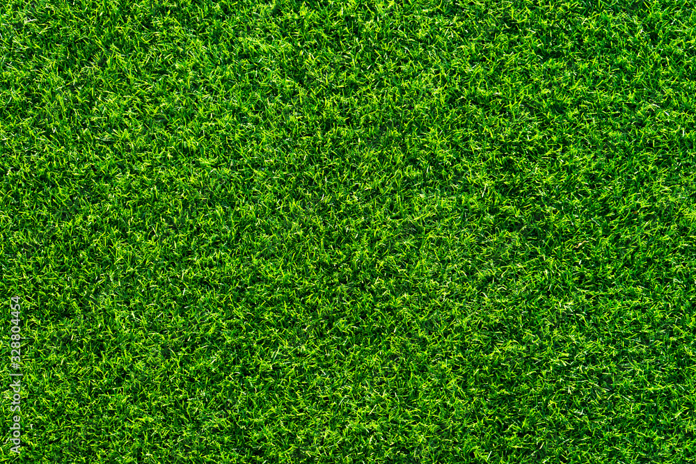 Fototapeta premium Close up of beautiful Artificial grass texture on the beach in summer time as background