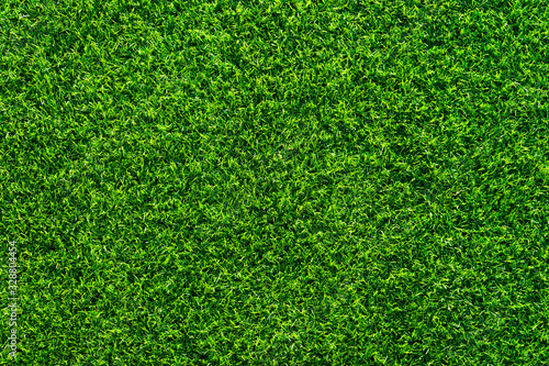 Close up of beautiful Artificial grass texture on the beach in summer time as background