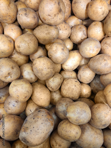 a lot of potatoes in the store close-up  top view