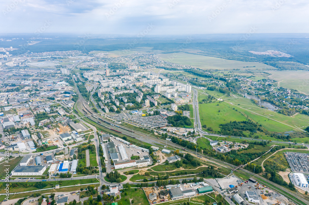 aerial panoramic view on industrial district of big city. drone photography