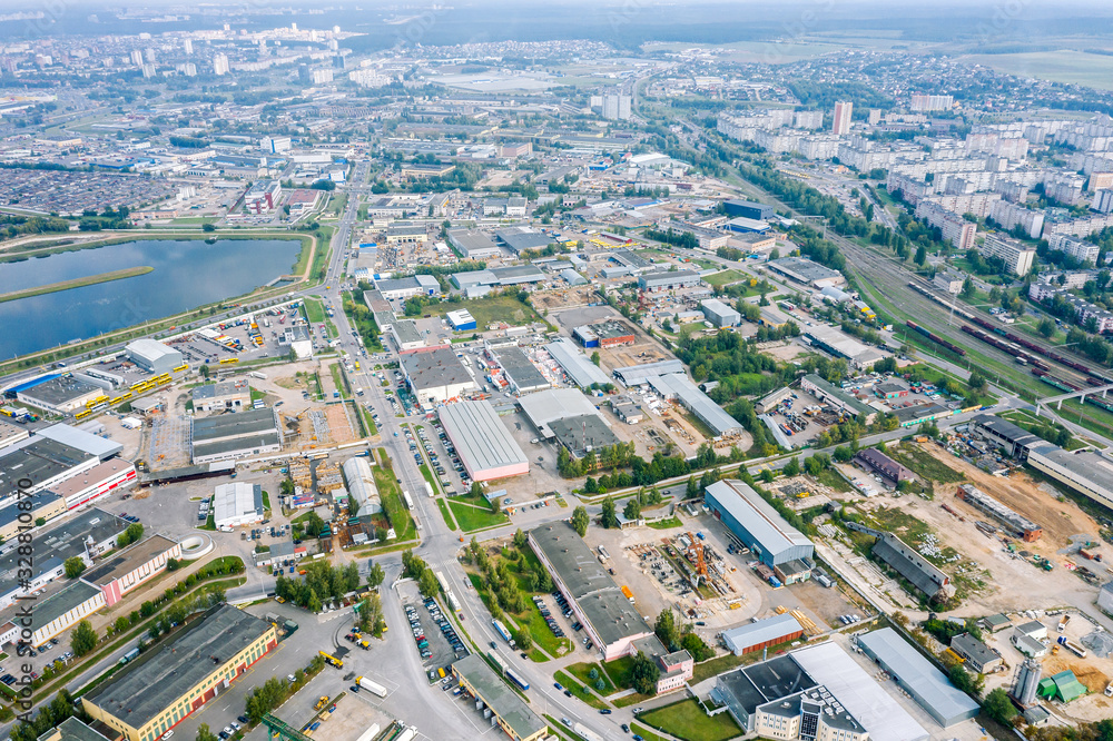 panoramic top view of industrial zone. city suburbs with different plants, manufactures, logistic centers