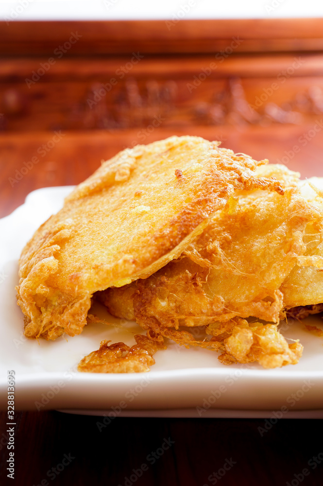 Fried bread slices with eggs in plate Fried bread slices with eggs in plate