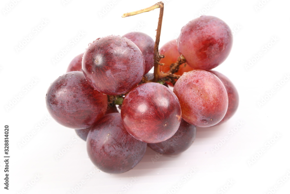 Red grape with water drops, closeup, isolated on white background