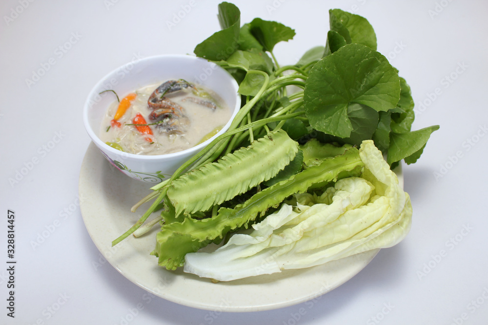 Soya bean dipping sauce with crab served with fresh vegetables isolated on white background, top view Soya bean dipping sauce with crab served with fresh vegetables isolated on white background, top view