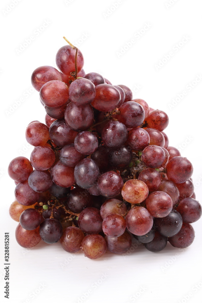 Red grape with water drops, closeup, isolated on white background