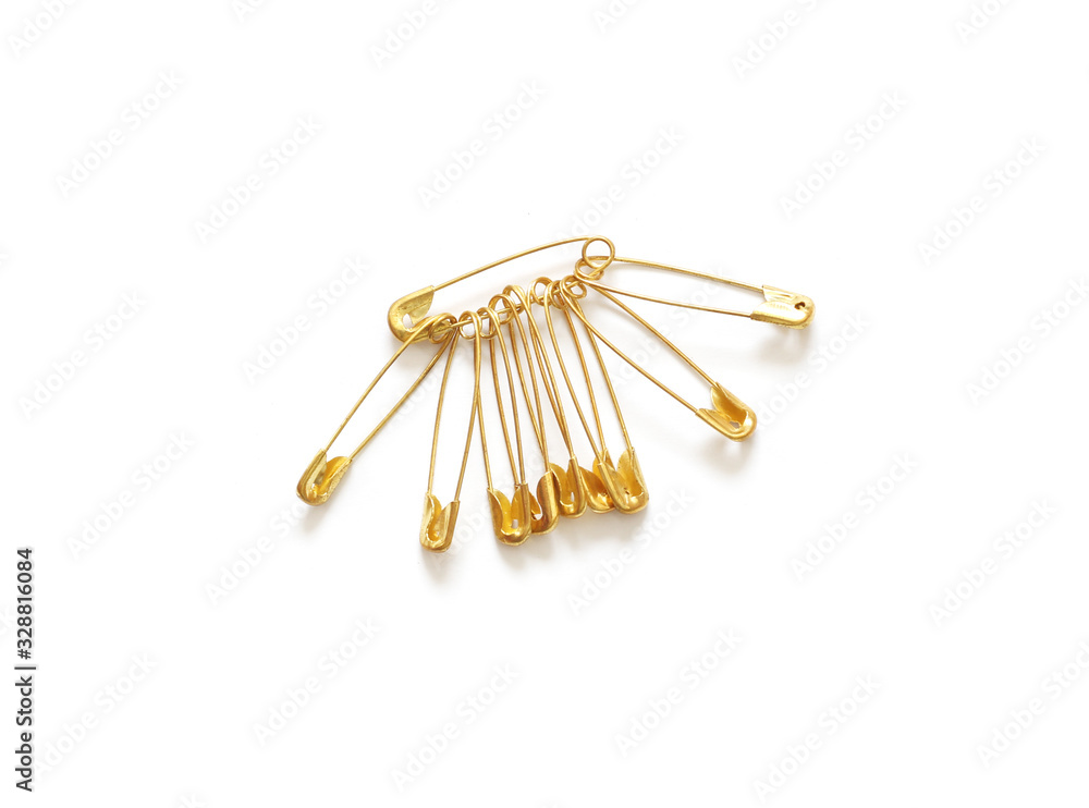 Regular safety pin isolated on white background Regular safety pin isolated on white background