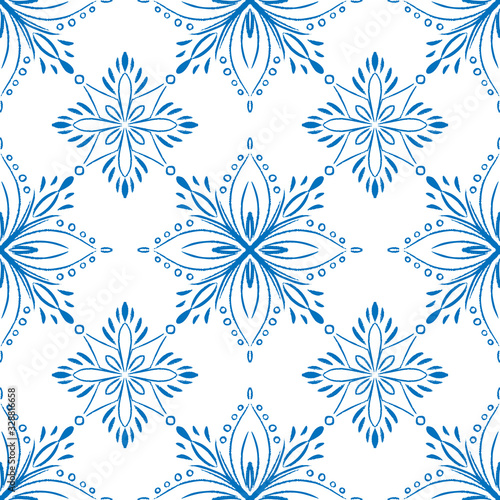 Blue tile seamless pattern design. Doodle snow or mandala illustration.