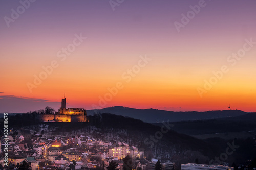 sunset in germany. this beautiful view can be found in Königstein, Germany. a great sunset in winter over a great hilly landscape with a village