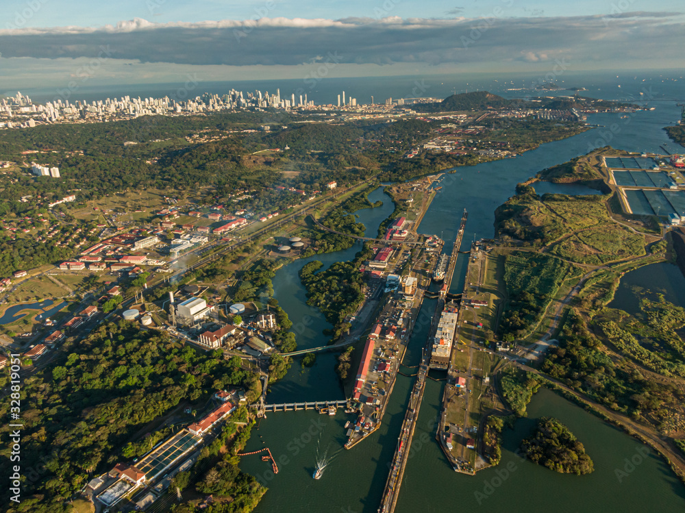 Beautiful aerial view of the Beautiful aerial view of the Panama Channel on the Sunset - obrazy, fototapety, plakaty 