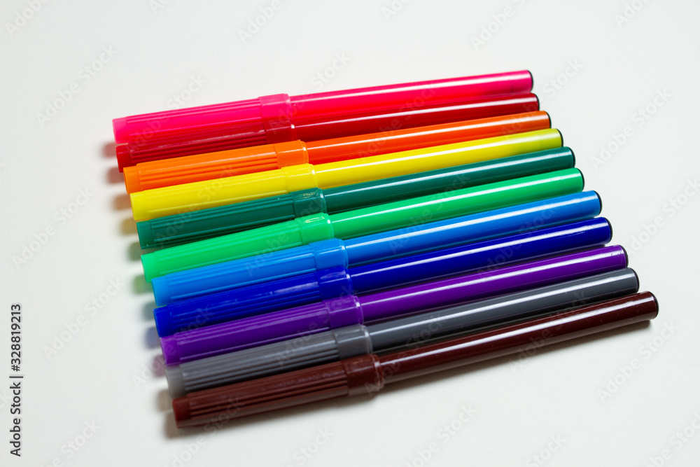 colorful felt-tip pens on the white background colorful felt-tip pens on the white background