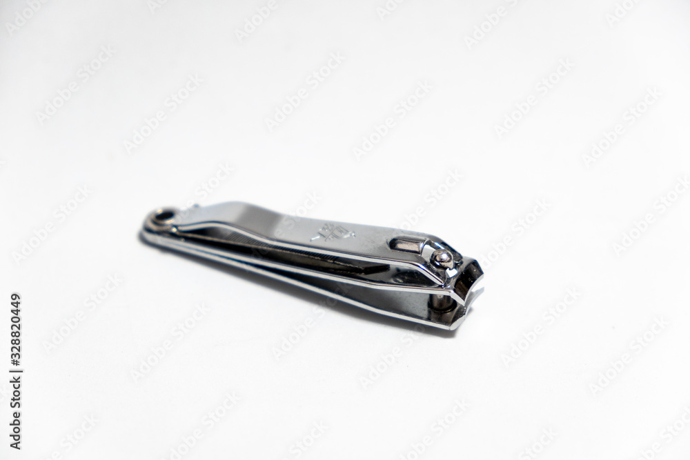 Close-up old Nail clippers isolated on white background Close-up old Nail clippers isolated on white background
