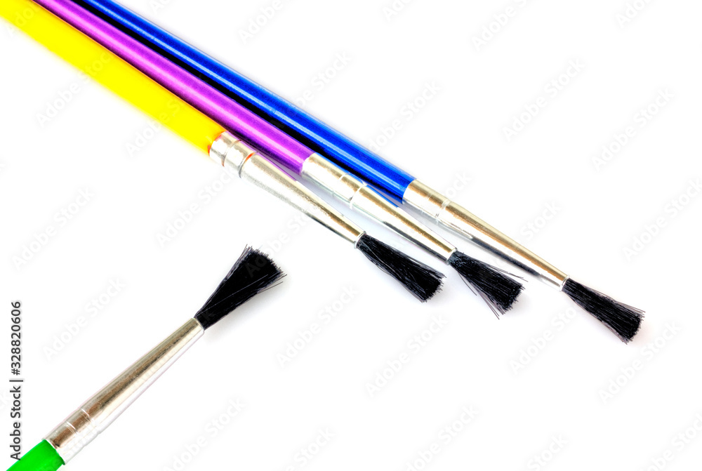 Paint brushes isolated on white background close up view Paint brushes isolated on white background close up view