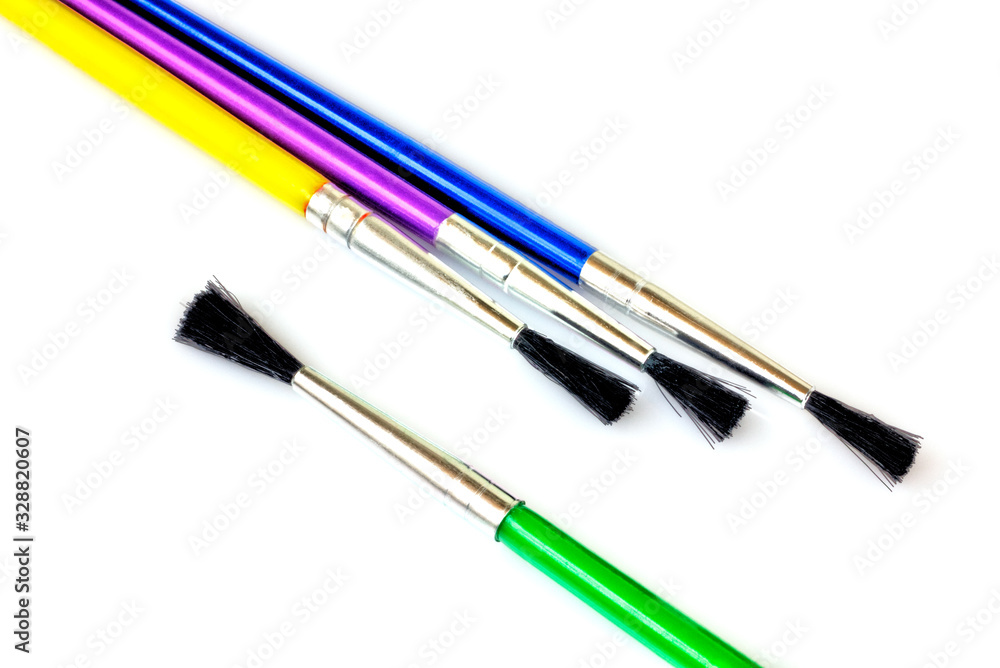 Paint brushes isolated on white background close up view Paint brushes isolated on white background close up view