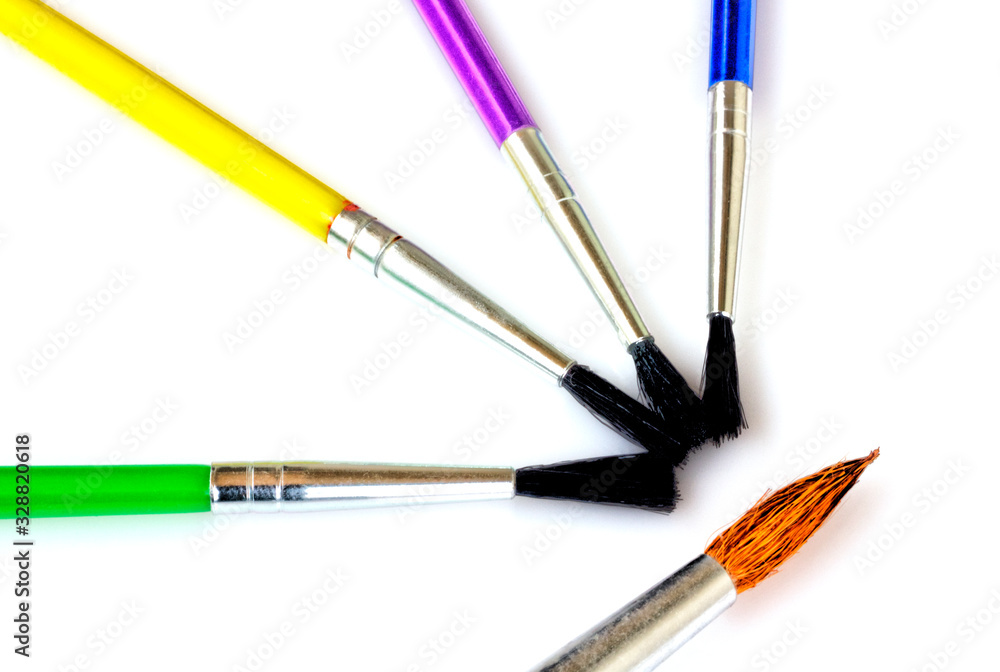 Paint brushes isolated on white background close up view Paint brushes isolated on white background close up view