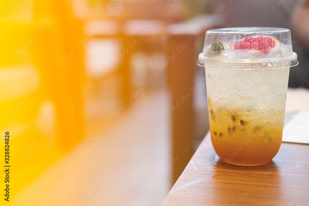 A glass of fresh passion fruit juice mix with soda A glass of fresh passion fruit juice mix with soda