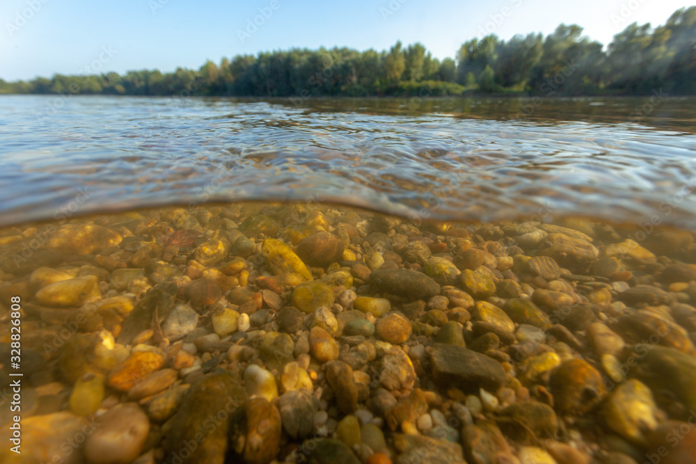 Underwater view of the gravel riverbed on the Drava River in Croatia