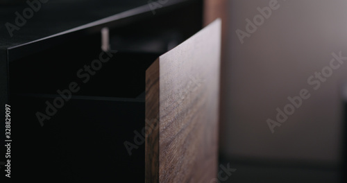 open tv stand drawer closeup © GCapture