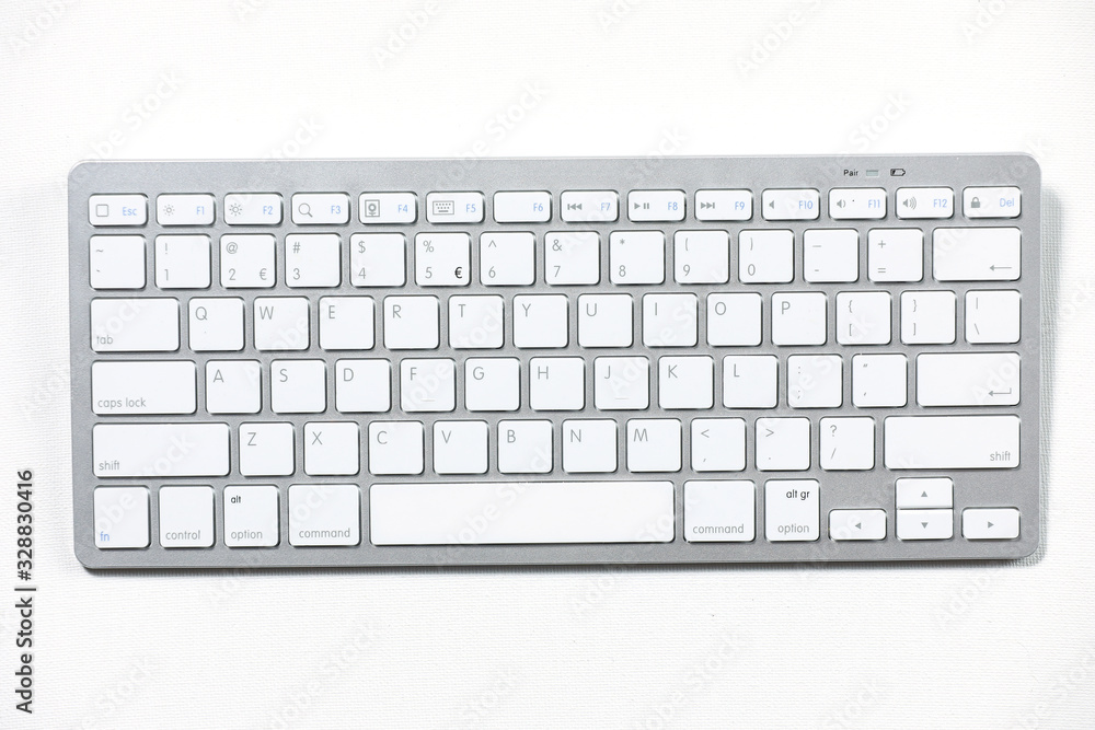 White keyboard isolated on a white background. White keyboard isolated on a white background.