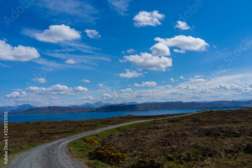 isle of skye blue road lake mountains