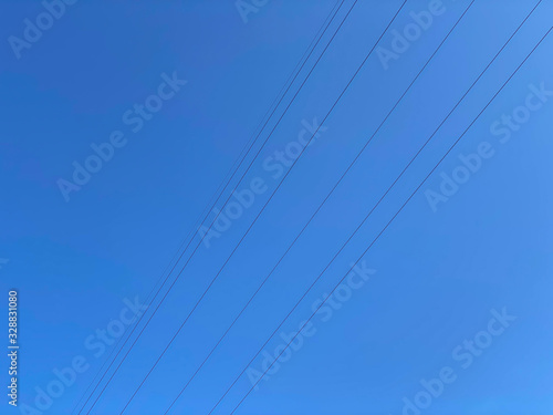 Japanese blue sky and electric wires.