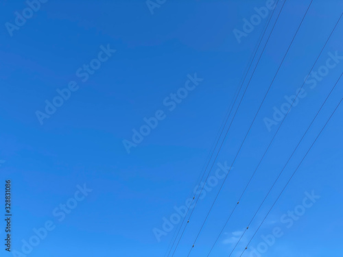 Japanese blue sky and electric wires.