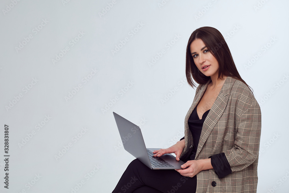 young woman with laptop in formal wear young woman with laptop in formal wear