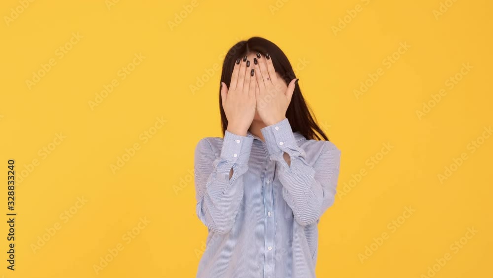 Different emotions Asian girls on a yellow background . Different emotions Asian girls on a yellow background .