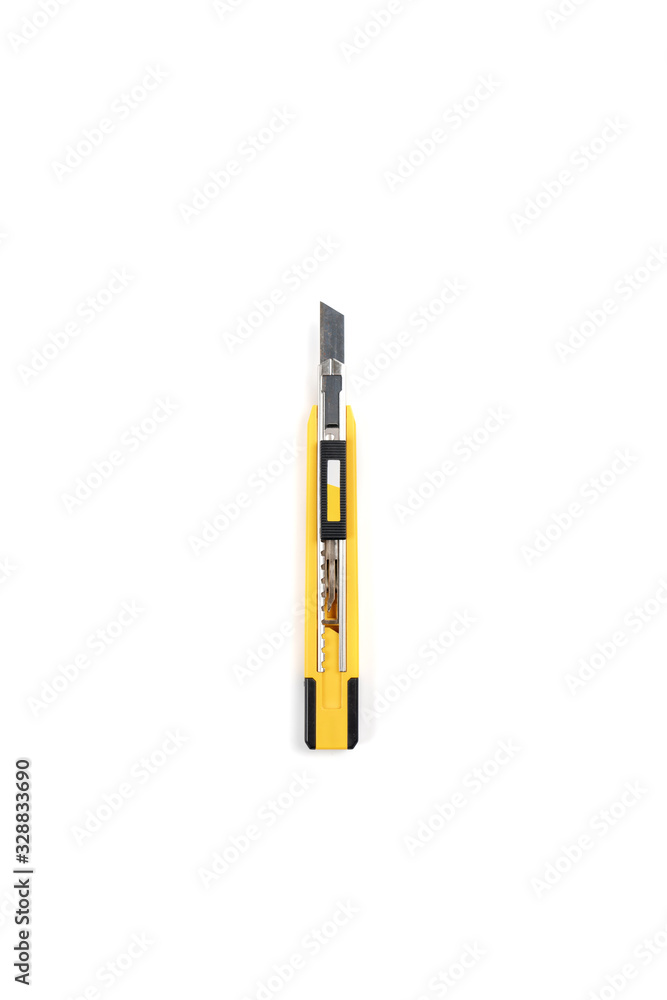 Isolated yellow smart cutter normal size on white background. Clipping path. Isolated yellow smart cutter normal size on white background. Clipping path.
