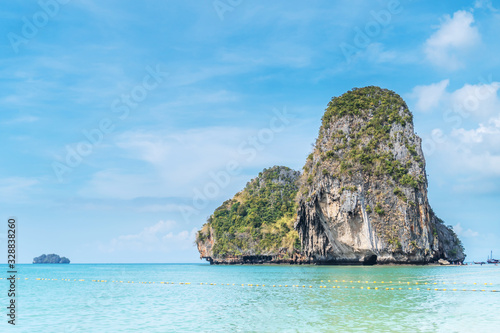 Tropical holidays - Stunning view of Railay Beach with limestone rock in Krabi, Thailand.
